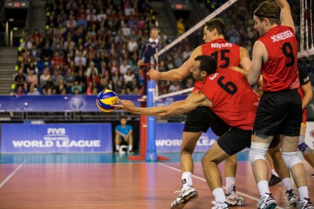 Canada's Dustin Schneider (9), Justin Duff (6) and Fred Winters (15)