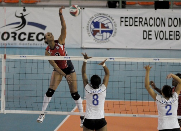 Gaila Gonzalez of Dominican Republic spikes against  Nicaragua