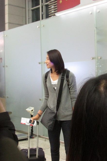 Kim at the airport