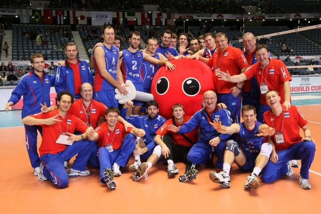 Russian team pose after their win over Iran whereby they claimed a pass for the London Olympics