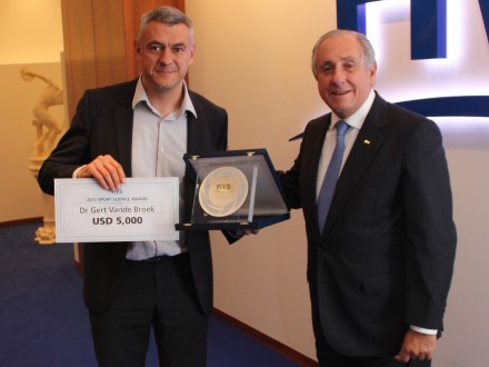 Dr. Gert Vande Broek with FIVB President Dr. Ary S. Graça F