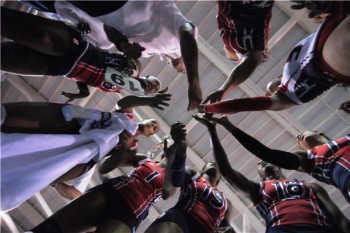 Dominican Republic team gathers during the match