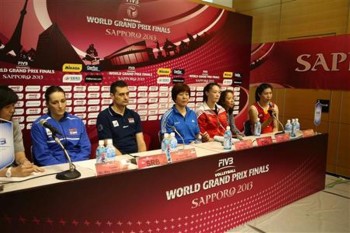 Players and coaches attend the post-match press conference