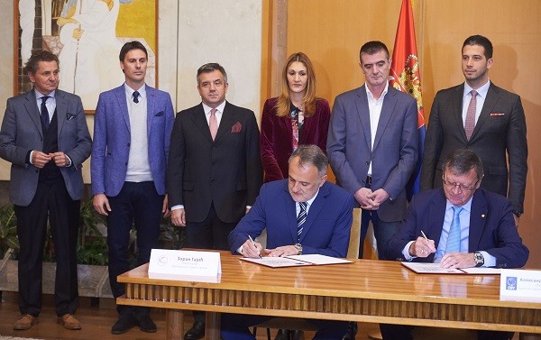 Gajic & Boricic signing an agreement