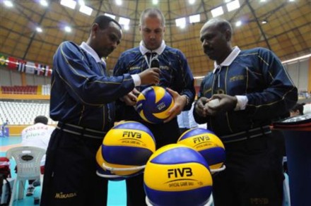 referees and balls in volleyball